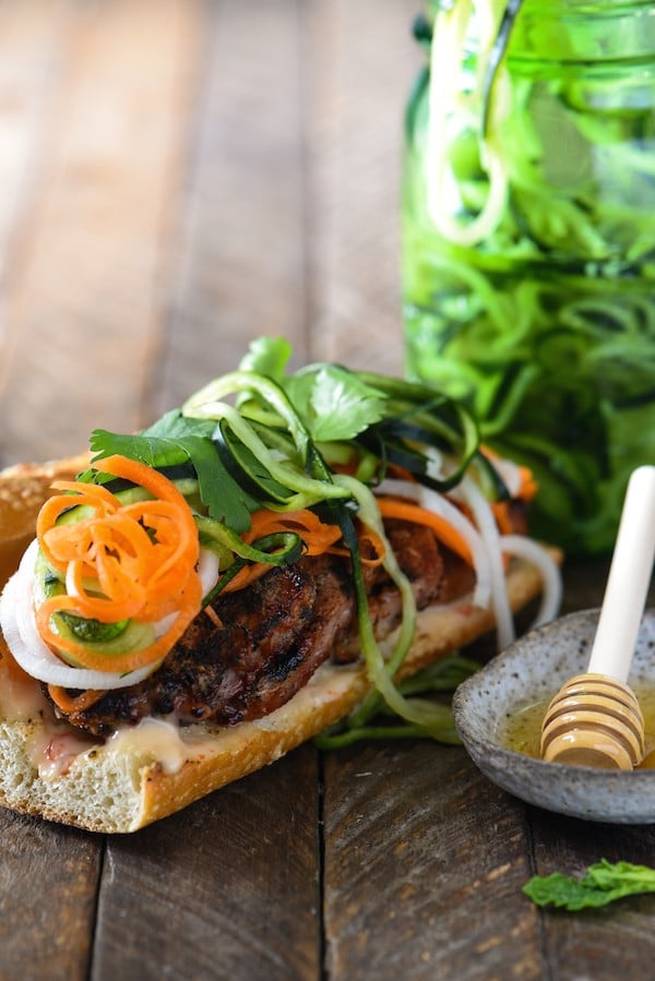 Honey Grilled Pork Banh Mi with Spiralized Pickled Vegetables - Prep ahead for an assemble-and-serve weeknight meal. Quick on time, HUGE on Asian flavor. | foxeslovelemons.com