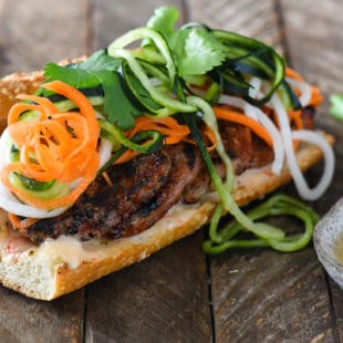 Honey Grilled Pork Banh Mi with Spiralized Pickled Vegetables - Prep ahead for an assemble-and-serve weeknight meal. Quick on time, HUGE on Asian flavor. | foxeslovelemons.com