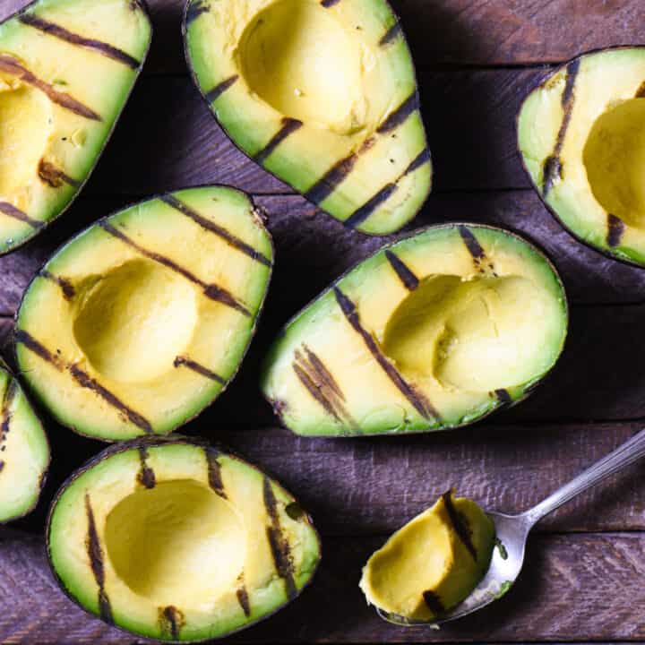 Grilled Avocado Crostini Board - A fun party idea! Pile a bunch of fresh toppings onto a big platter, and let your guests assemble their own grilled avocado crostini! | foxeslovelemons.com