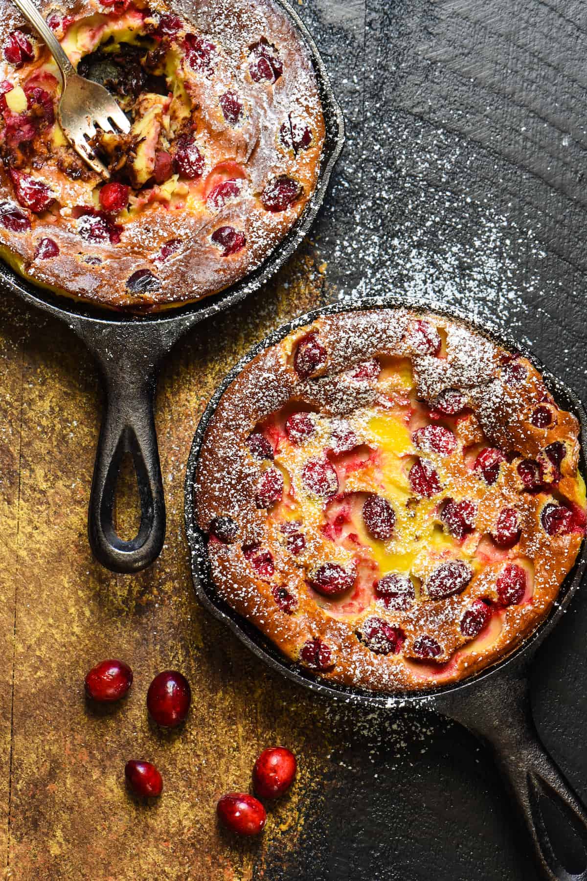 Cranberry Chocolate Chip Clafoutis - Impress your family and friends with this fancy-sounding but super easy (you make the batter in a BLENDER!) custard dessert. | foxeslovelemons.com