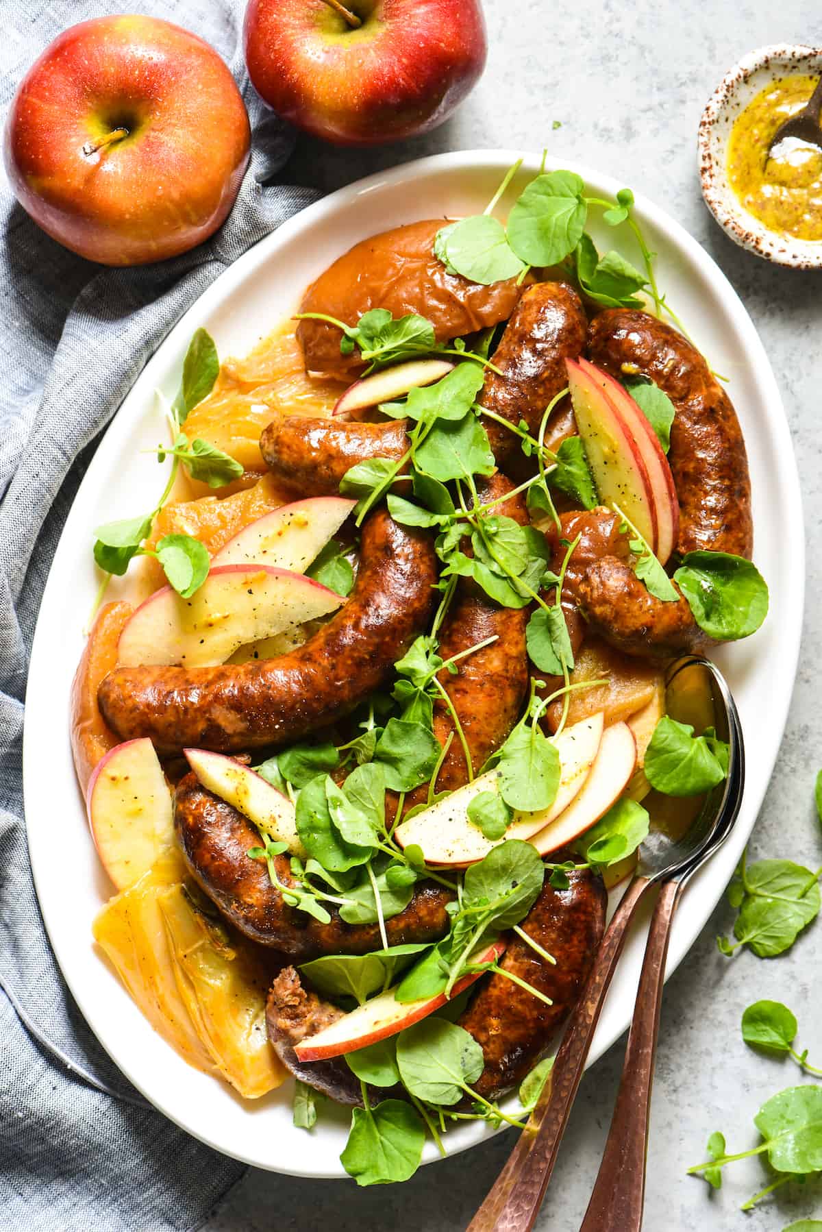 Pan-Seared Sausage With Lady Apples and Watercress Recipe