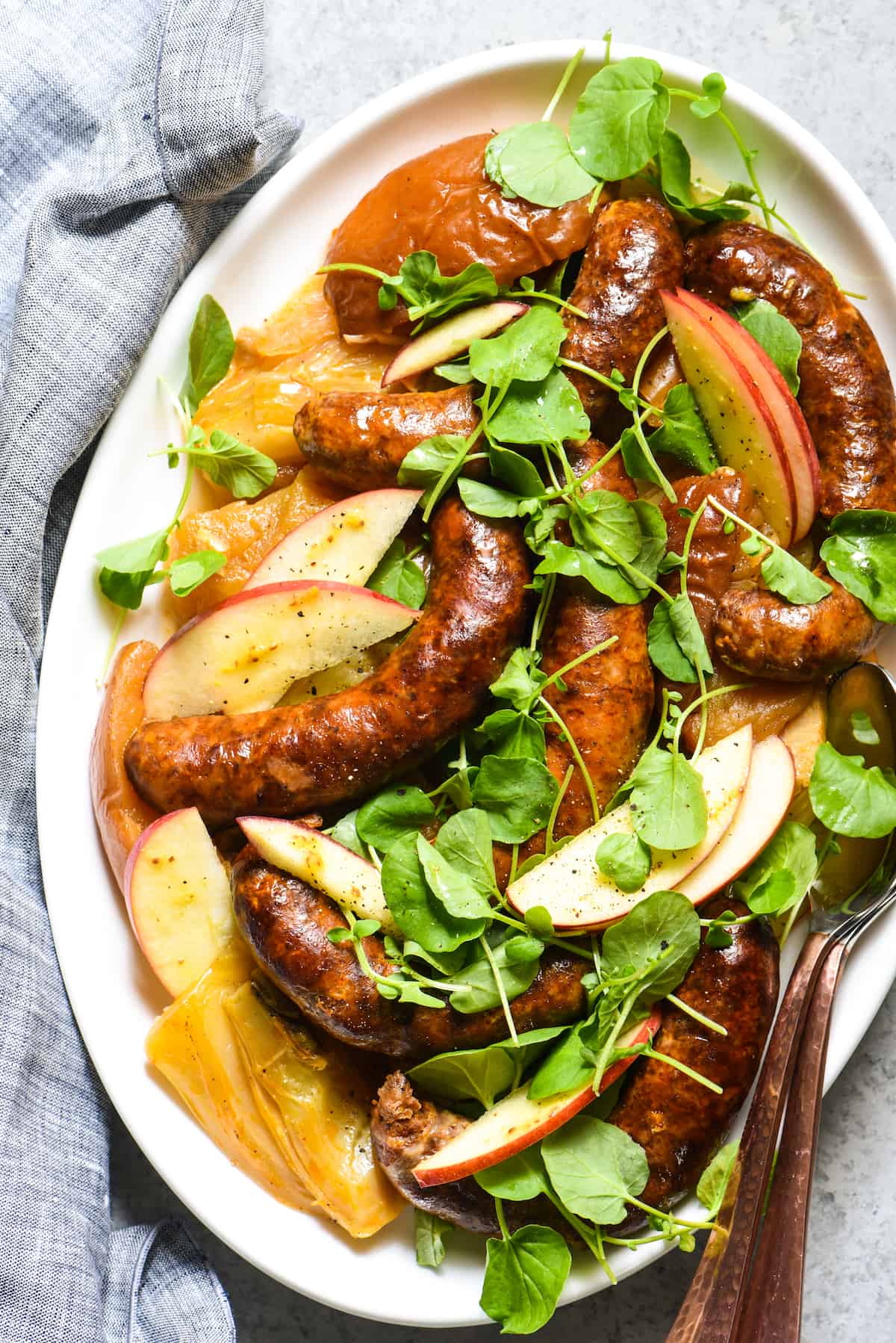 Pan-Seared Sausage With Lady Apples and Watercress Recipe