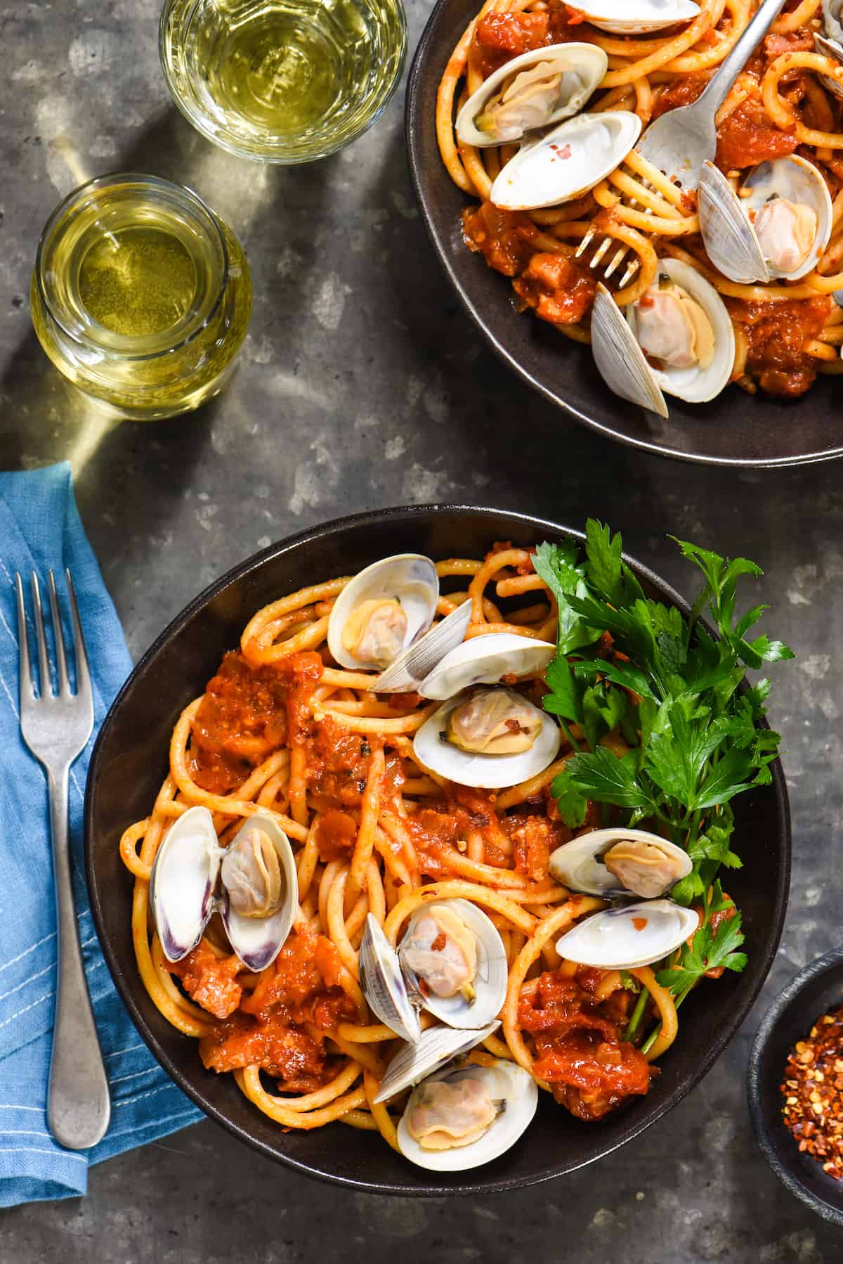 Pasta all'Amatriciana with Clams - A rich, Roman-style pasta that you can easily make at home! | foxeslovelemons.com
