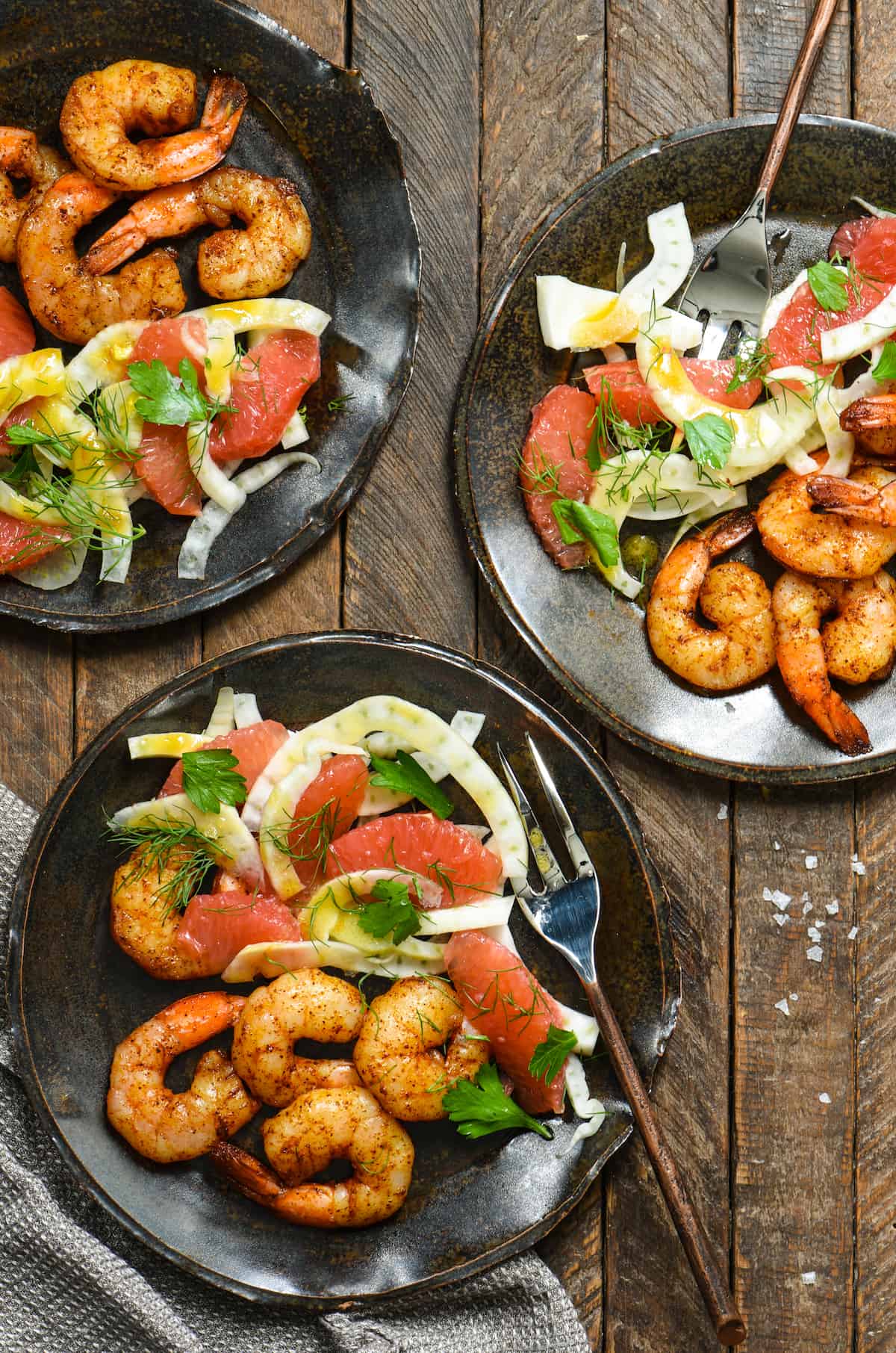 Roasted Shrimp with Grapefruit & Fennel Salad + 11 Grapefruit Recipes to Brighten Your Winter - Bring some happy flavor to a cold day with an appetizer, cocktail, breakfast, salad, lunch or dinner celebrating juicy, sweet grapefruit! | foxeslovelemons.com