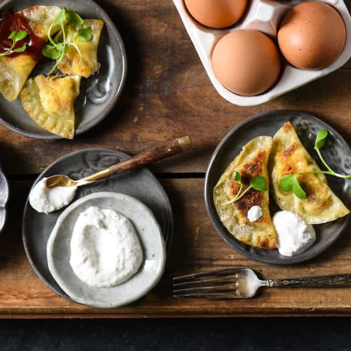 Lazy Sunday Breakfast Dumplings - Make brunch fun again with these sausage, egg and cheese wontons served with two easy dipping sauces. | foxeslovelemons.com