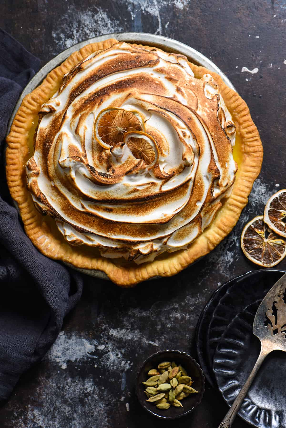 Lemon Cardamom Meringue Pie - Put an easy gourmet twist on a classic pie by adding a touch of cardamom to the meringue! | foxeslovelemons.com