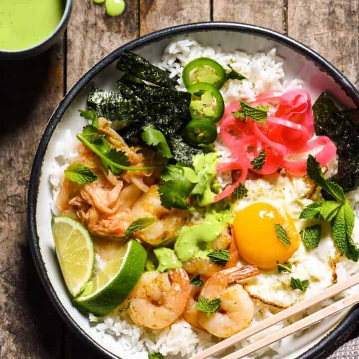 Funky Good Rice & Shrimp Bowls - Shake up your weeknight dinner routine with a rice bowl loaded with shrimp, pickled veggies and a fried egg, and topped with an easy homemade green chili sauce. | foxeslovelemons.com