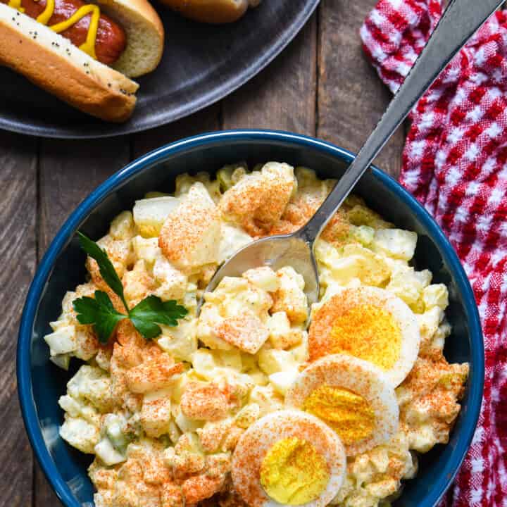 This Good Midwestern Potato Salad is the side dish of your dreams. Potatoes, eggs, celery and onion, dressed with a creamy, tangy sauce. So simple and so good! | foxeslovelemons.com