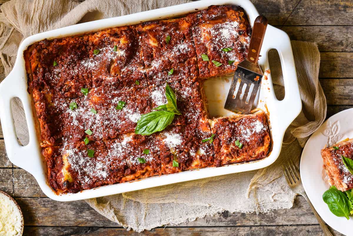 Overhead photo of a large white casserole dish filled with a Italian pasta casserole.