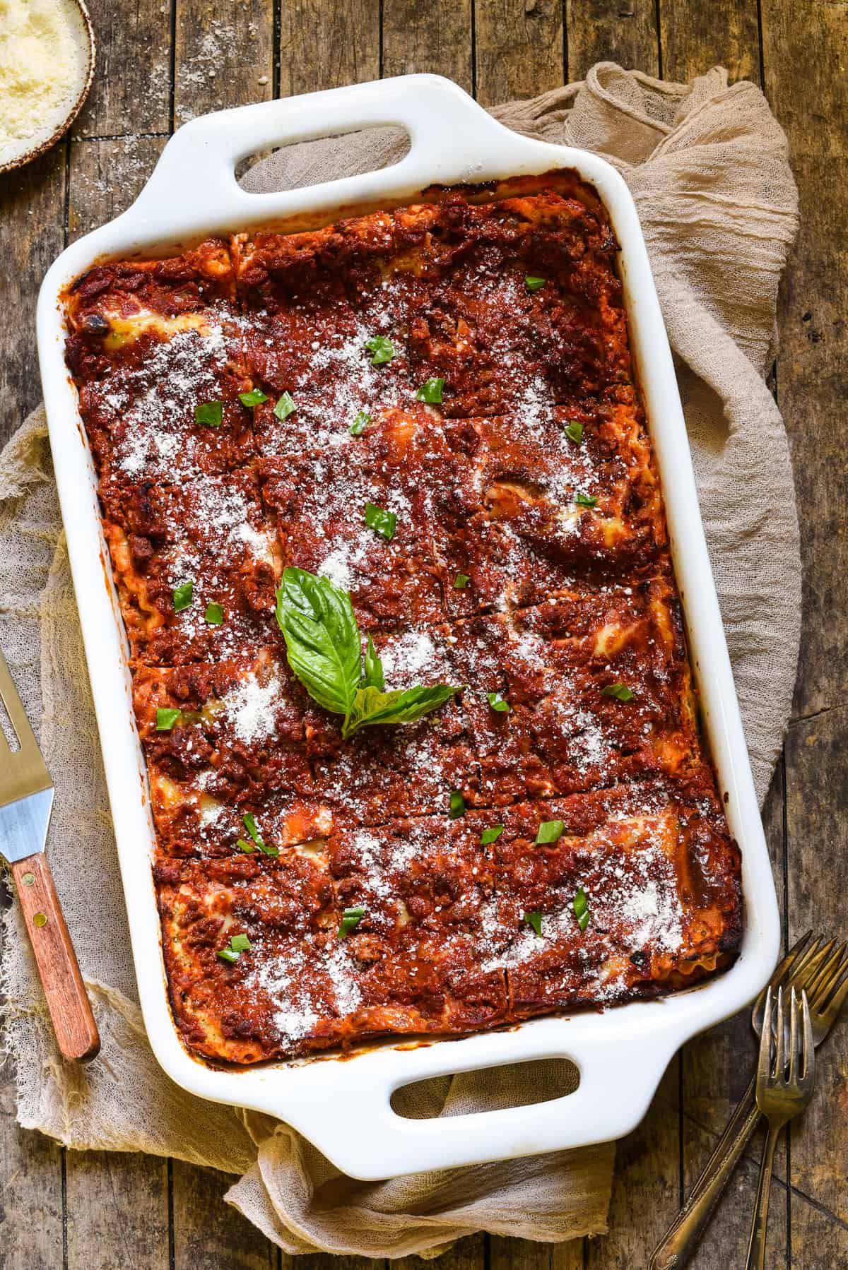 Overhead photo of a large rectangular white casserole dish filled with cottage cheese lasagna.