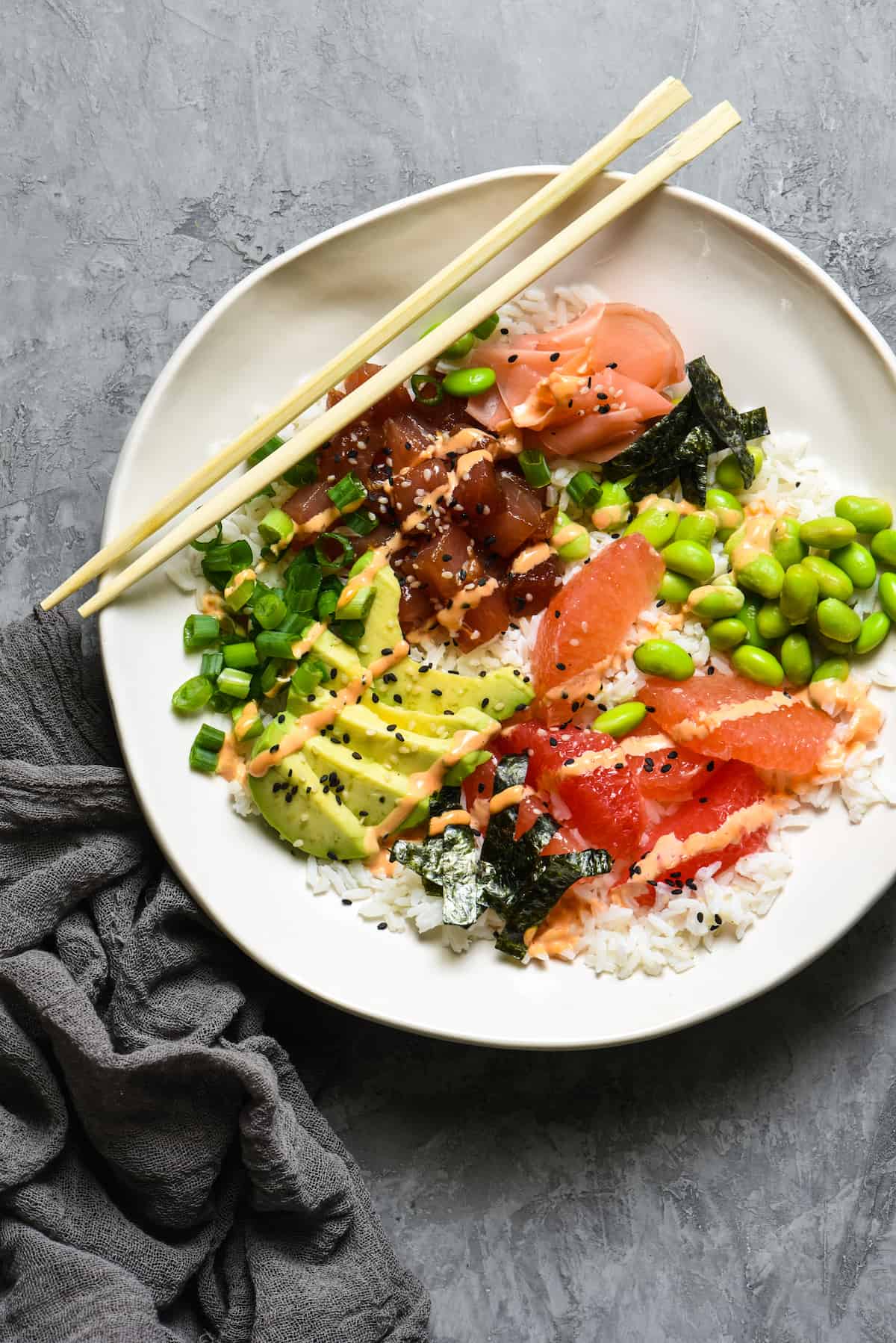 Grapefruit & Ahi Tuna Poke Bowl + 11 Grapefruit Recipes to Brighten Your Winter - Bring some happy flavor to a cold day with an appetizer, cocktail, breakfast, salad, lunch or dinner celebrating juicy, sweet grapefruit! | foxeslovelemons.com