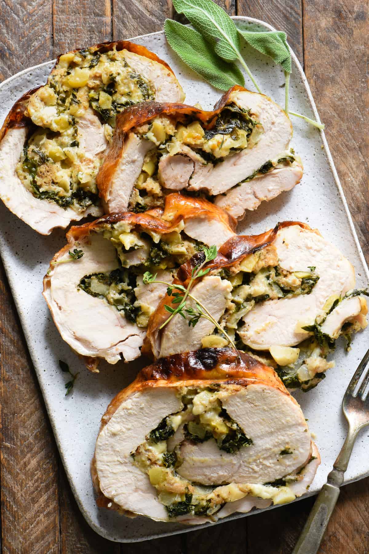 Not cooking for a huge crowd this Thanksgiving? This Blue Cheese & Apple Turkey Breast Roulade makes 6 servings, and can be prepped a day in advance. It is so packed with sweet and savory flavor that you might end up wishing you had made two! | foxeslovelemons.com