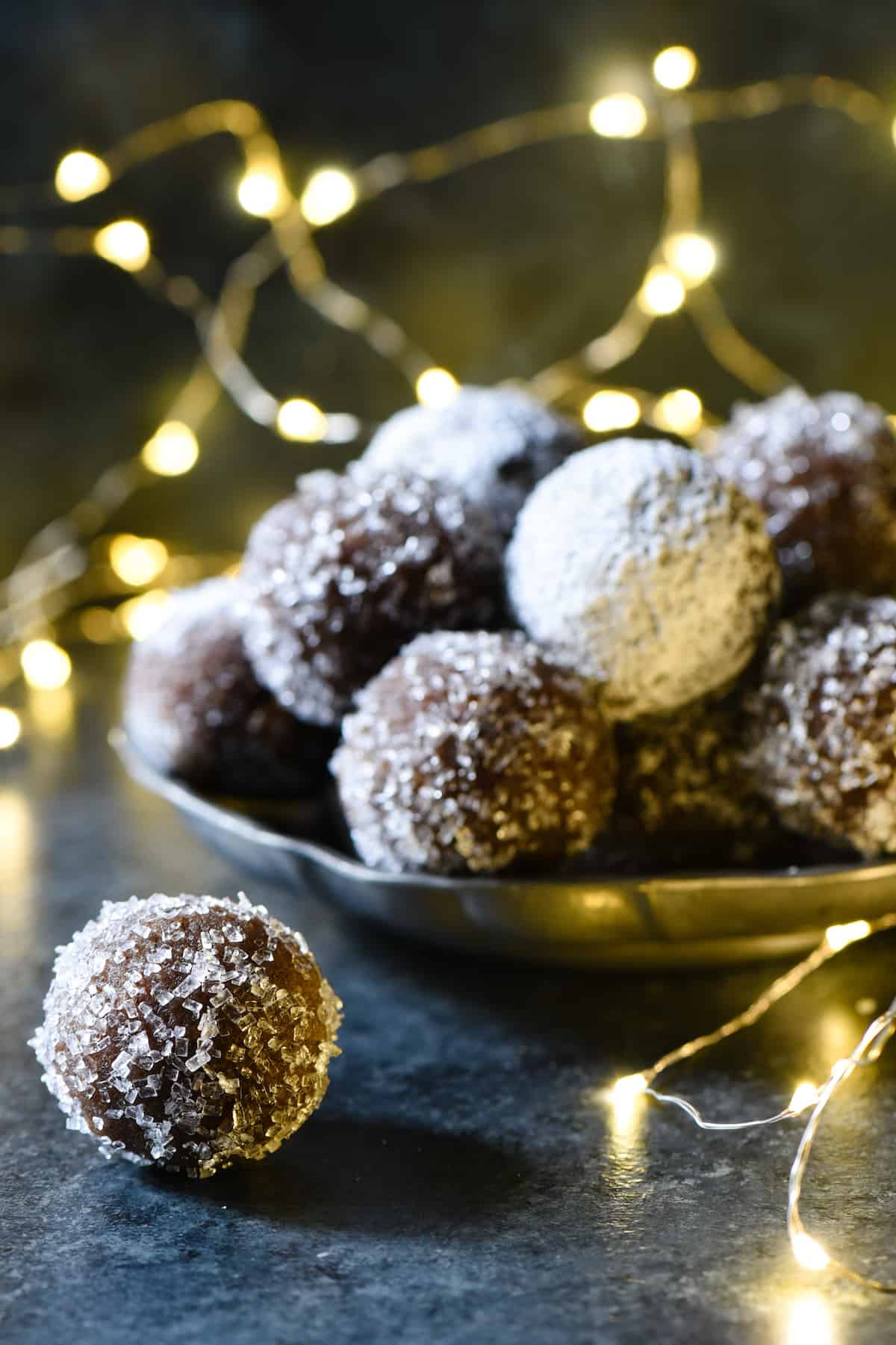 These Almond Flour Rum Balls are a sophisticated alternative to frosting-laden holiday treats, and perfect with a cup of coffee or tea. Naturally gluten free. | foxeslovelemons.com