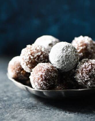 These Almond Flour Rum Balls are a sophisticated alternative to frosting-laden holiday treats, and perfect with a cup of coffee or tea. Naturally gluten free. | foxeslovelemons.com