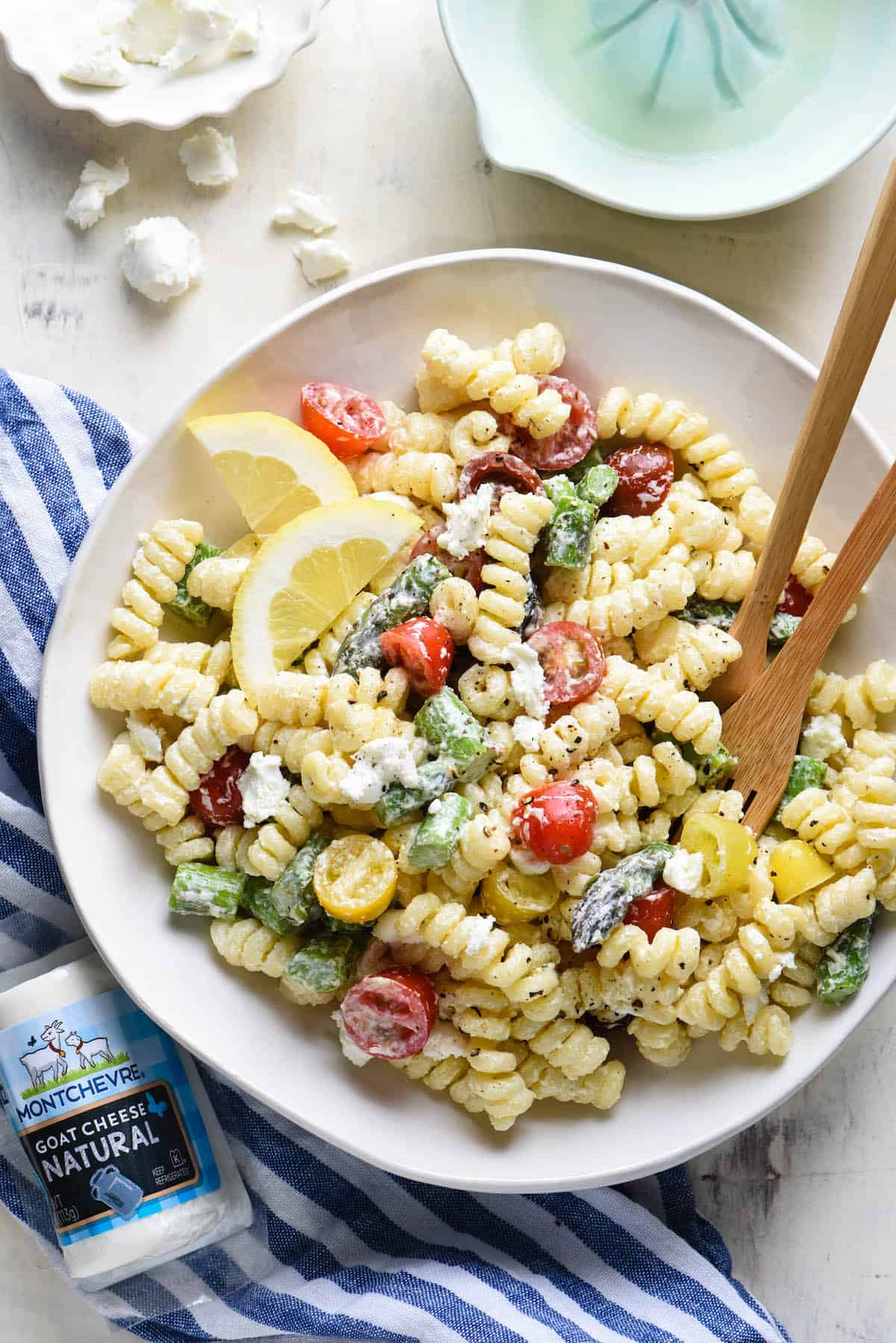 This creamy goat cheese pasta salad is simple to put together and will become a family favorite! Customize with any vegetables you like. | foxeslovelemons.com