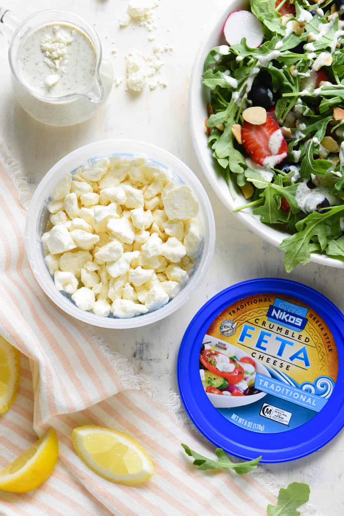 Take your salad game up a notch with this quick and easy homemade Creamy Lemon Feta Dressing. Use it to dress greens or pasta salad, add some pizazz to grilled chicken, or serve as a veggie dip. | foxeslovelemons.com
