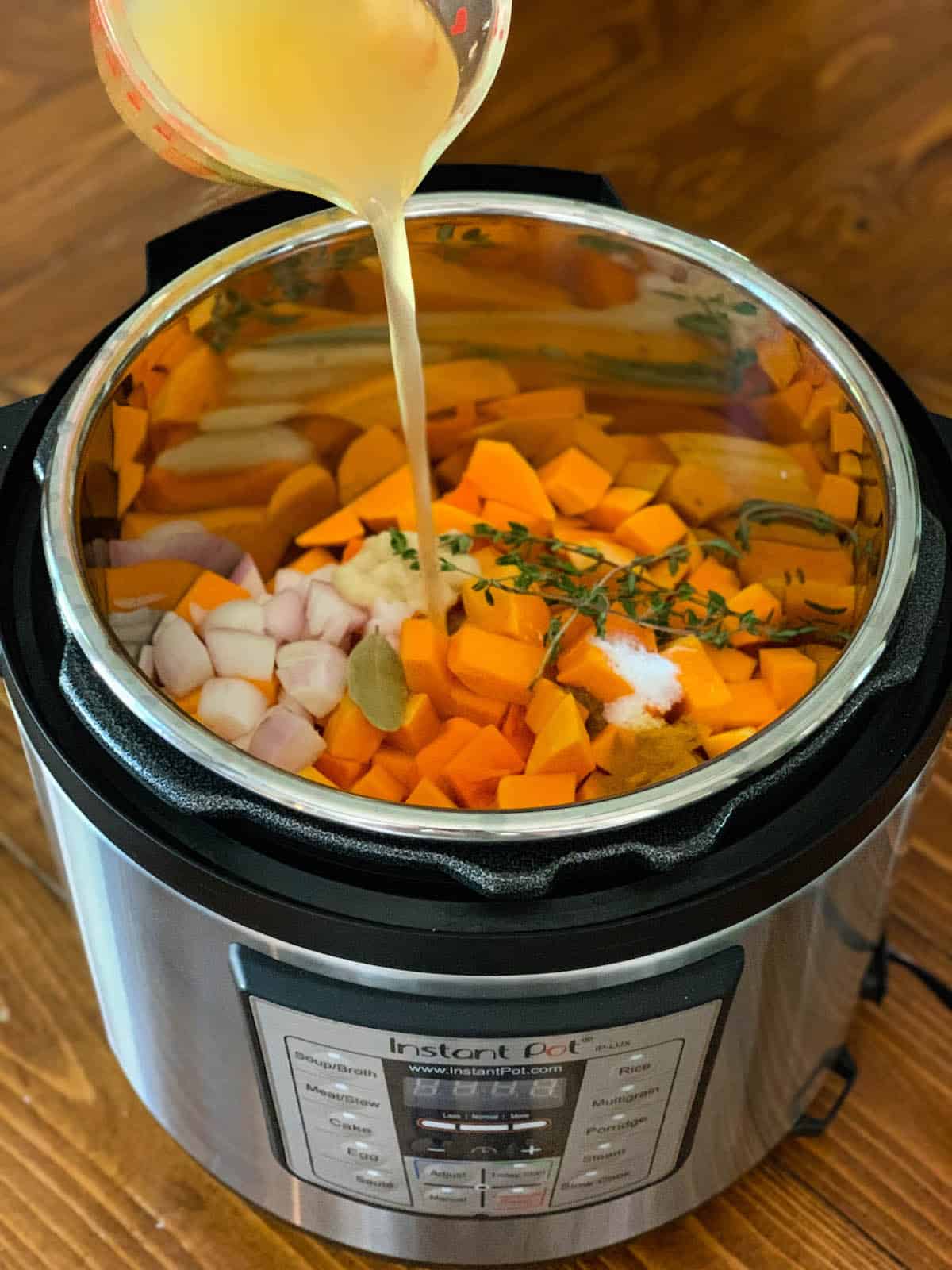 This simple Instant Pot Butternut Squash Soup cooks in just 6 minutes! Finishing with goat cheese adds a special touch that makes this a restaurant-quality dish you can easily make at home. | foxeslovelemons.com