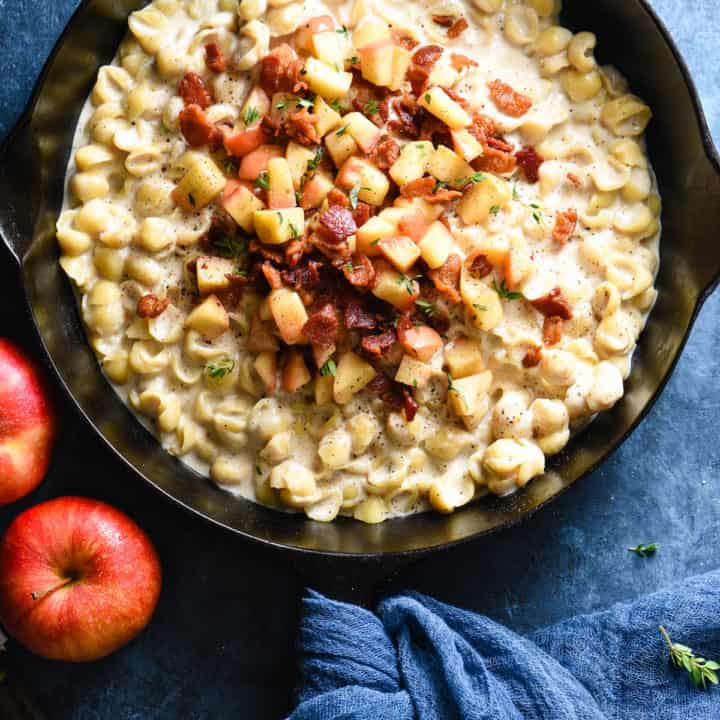 This Skillet Mac and Cheese with Bacon & Apples recipe can be made in a single skillet in 30 minutes flat. It's sure to become a weeknight favorite for the whole family! | foxeslovelemons.com