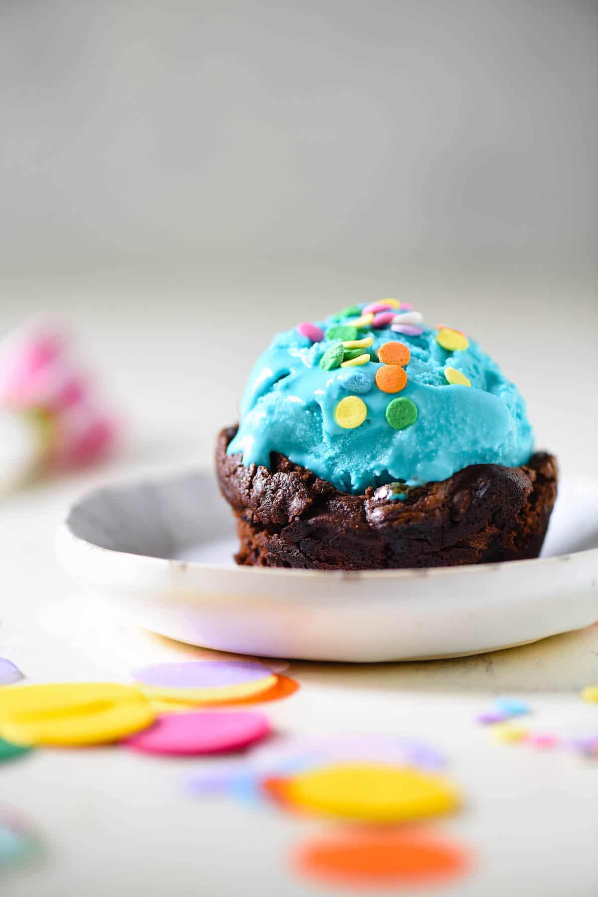 Celebrate one sweet birthday with these Brownie Bowls for Ice Cream. No special equipment needed - they're made in a cupcake pan! | foxeslovelemons.com