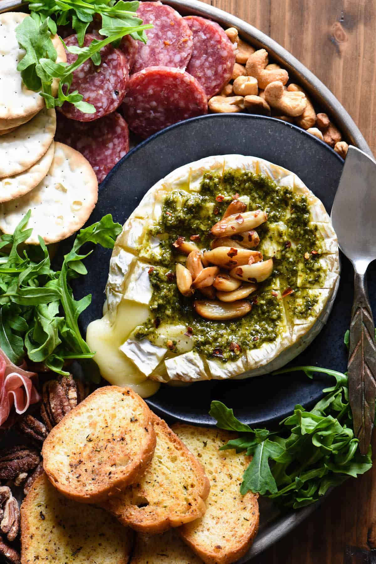 Savory Baked Brie With Pesto And Garlic Foxes Love Lemons 