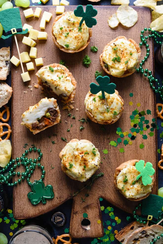 St. Patrick's Day party table featuring shepherd's pie muffins.
