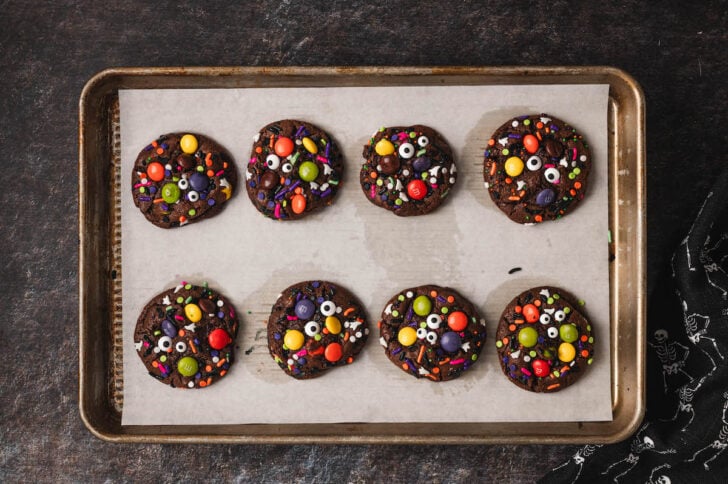 A Halloween cookies recipe finished on a rimmed baking pan.