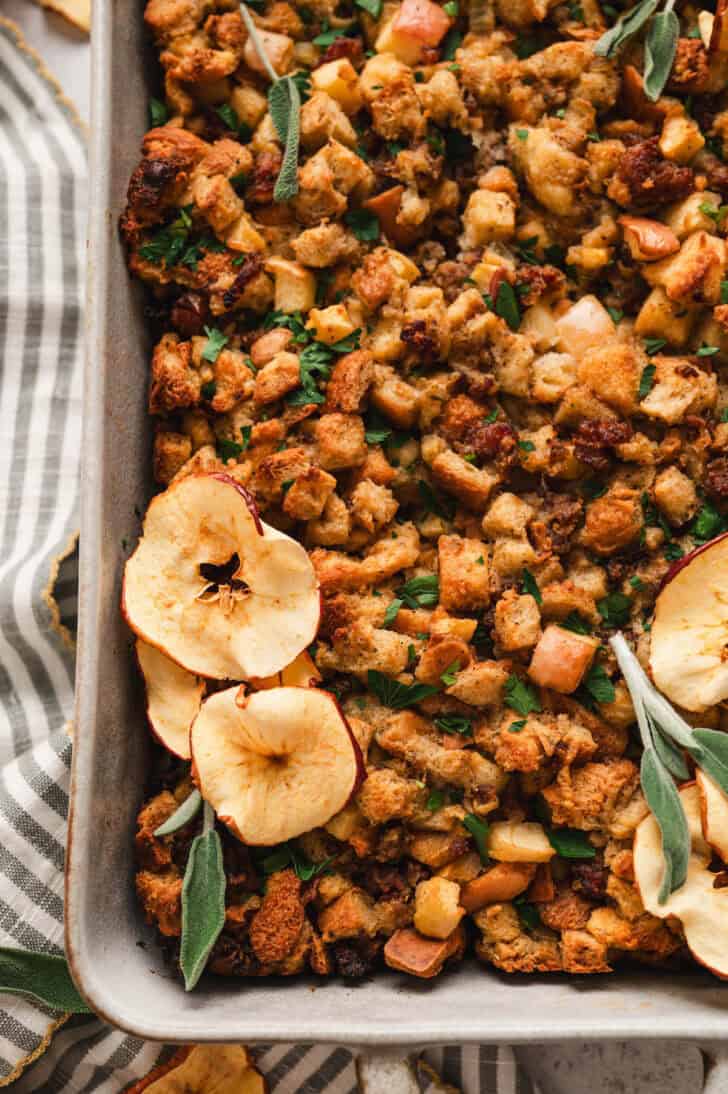 Apple sausage stuffing in a light baking dish.