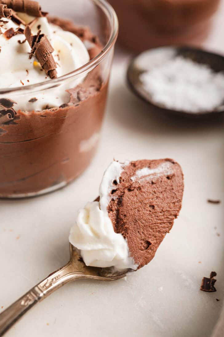 A spoon filled with the best chocolate mousse recipe.