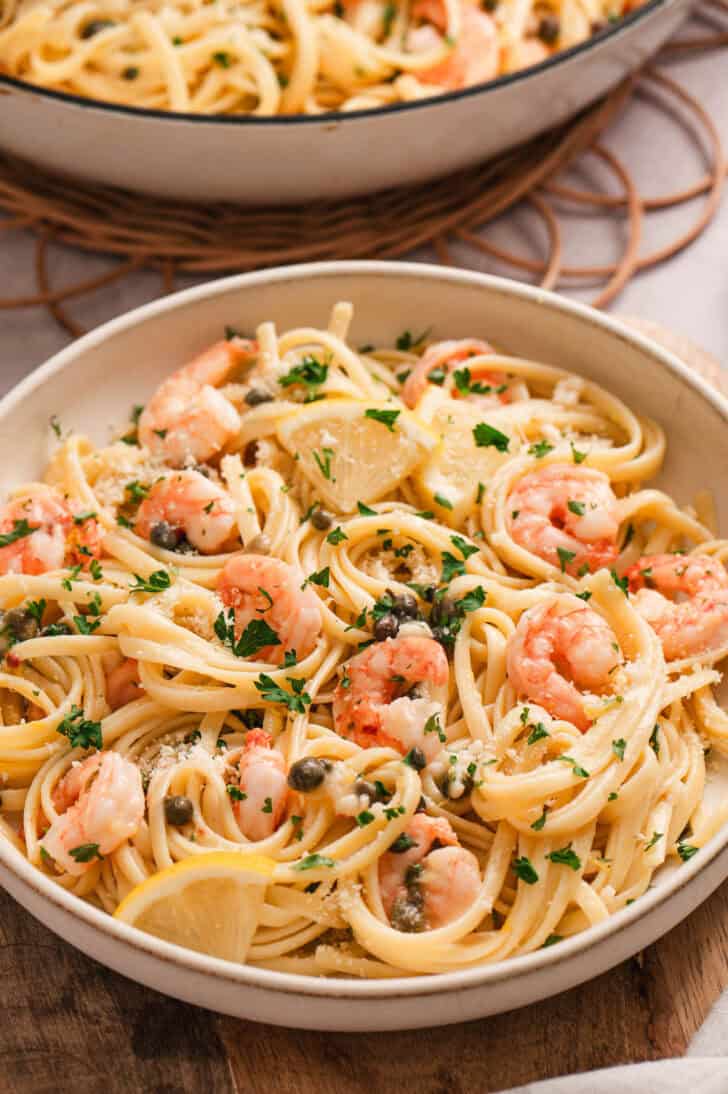 A low bowl filled with a lemon shrimp pasta recipe.