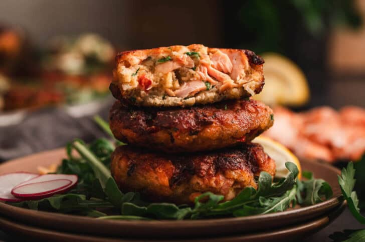 A stack of three salmon cakes from fresh salmon.