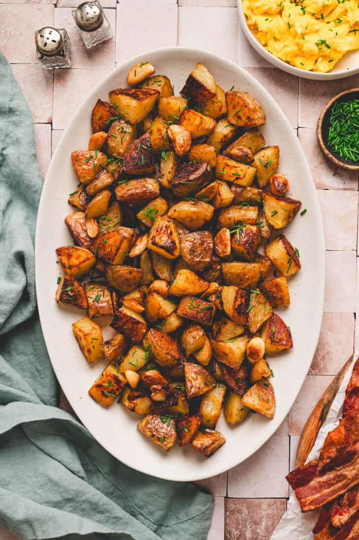 A white platter filled with a breakfast potato recipe.