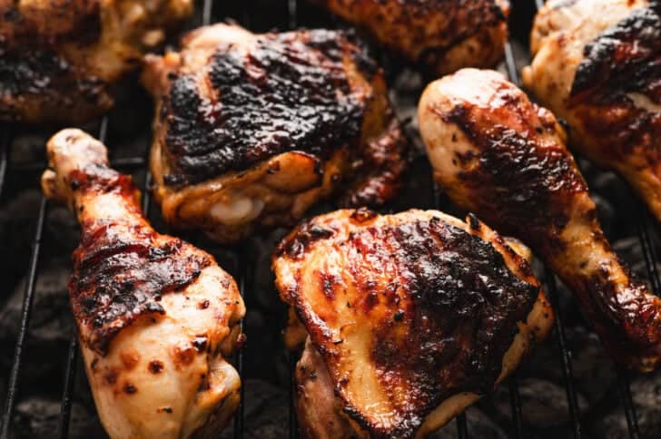 Buttermilk marinated chicken being cooked on a grill.