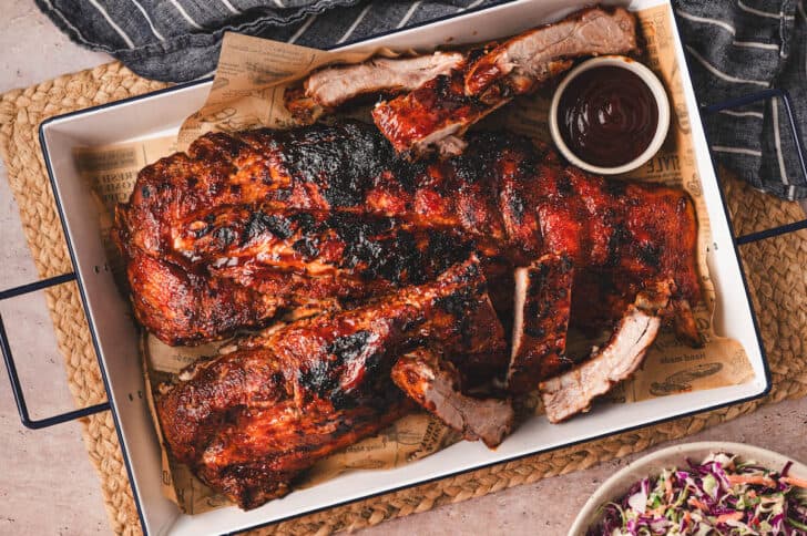 A large tray with Instant Pot pork ribs on it.