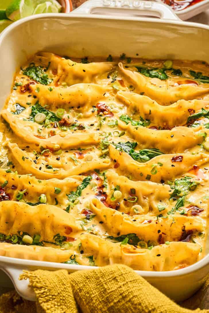 A baking dish filled with baked dumplings.
