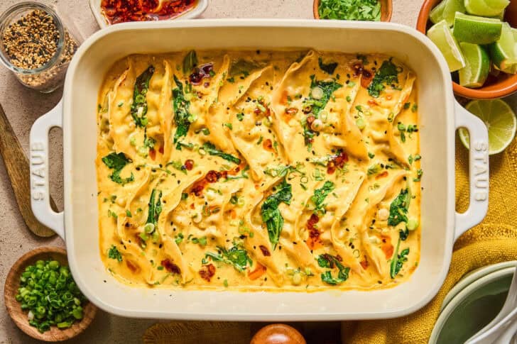 A white baking dish filled with the viral dumpling bake.