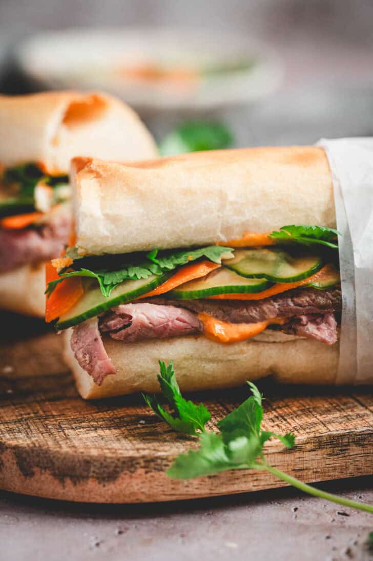 A side view of a prime rib sandwich recipe built on Jimmy John's day old bread.