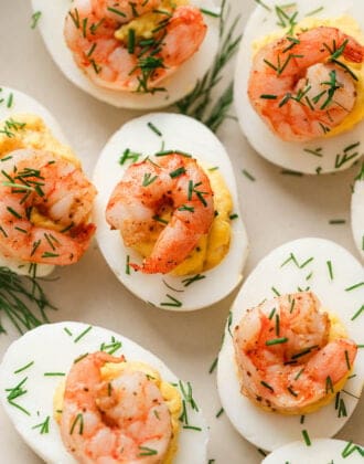 Shrimp deviled eggs on a light background.