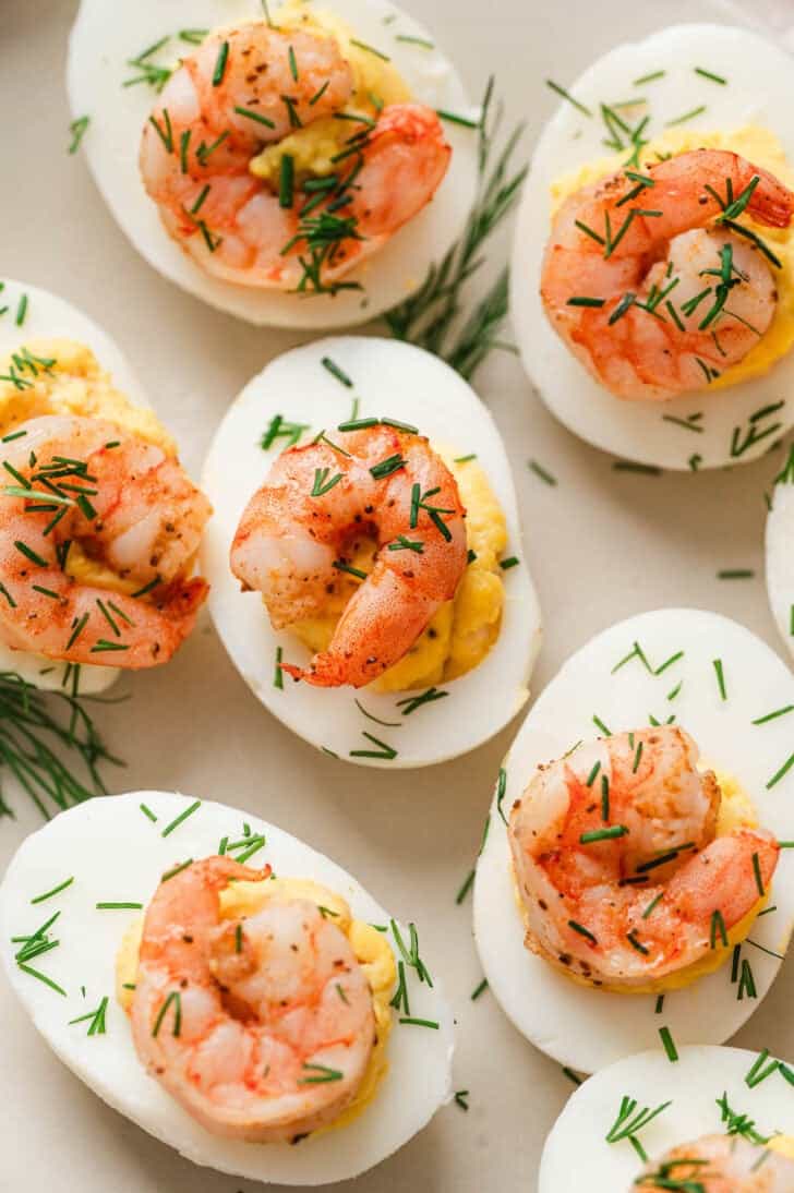 Shrimp deviled eggs on a light background.