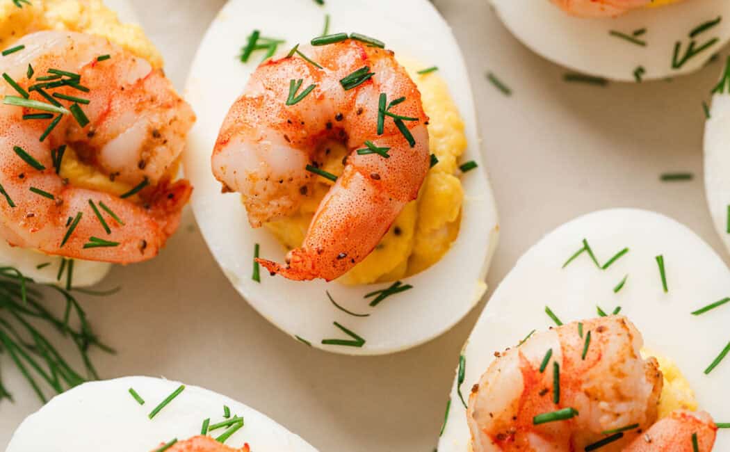 Shrimp deviled eggs on a light background.