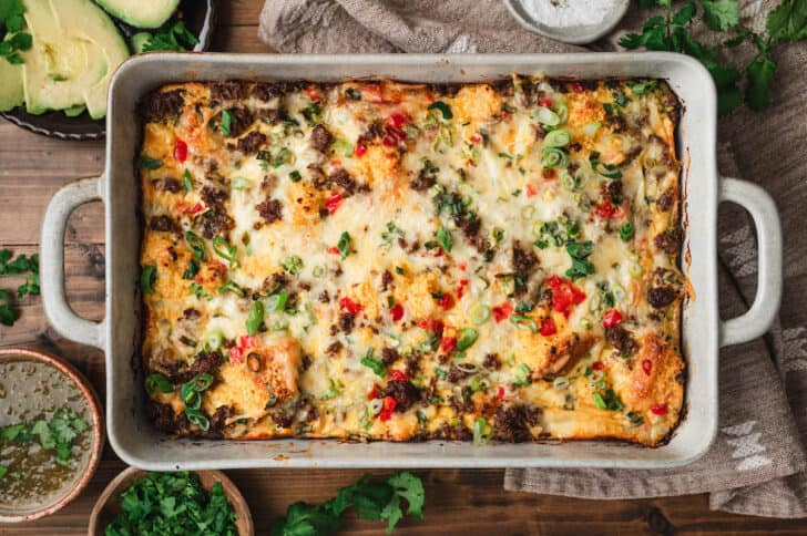 A cornbread sausage casserole in a rectangle baking dish.