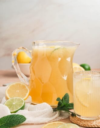 A glass pitcher filled with agave lemonade.