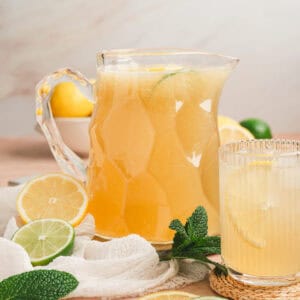 A glass pitcher filled with agave lemonade.